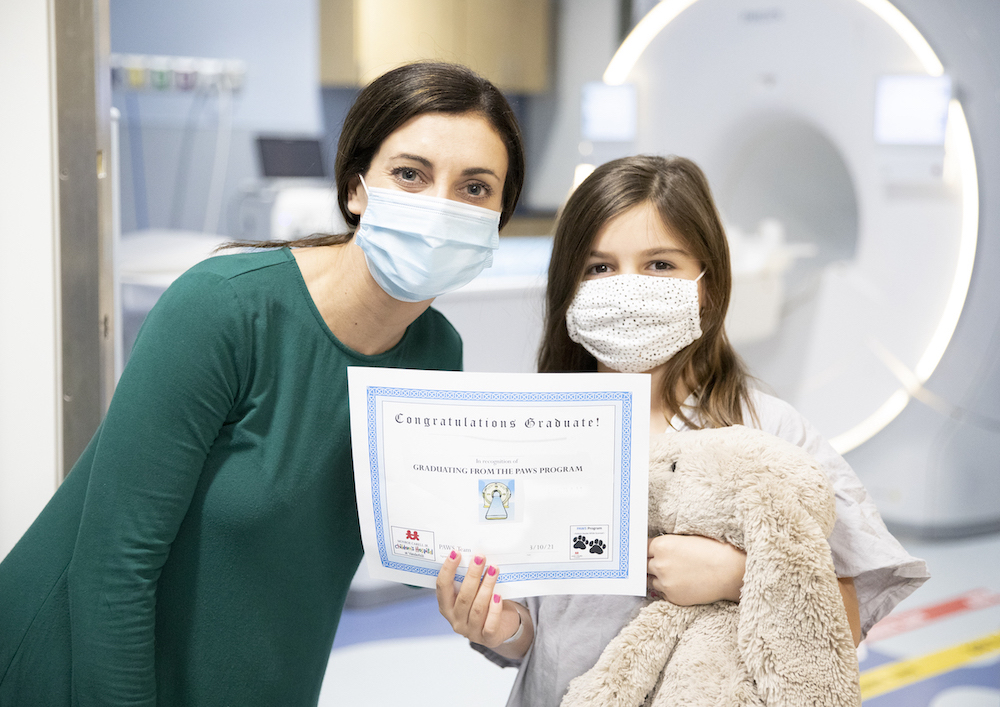 PAWS MRI graduate pediatric patient with child life specialist